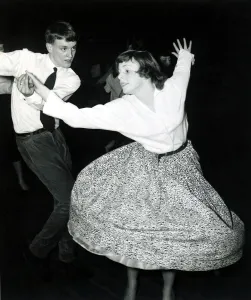 Skirt Prints: Fifties dancing - Skirt flared out as girl is spun around by her partner at the dance