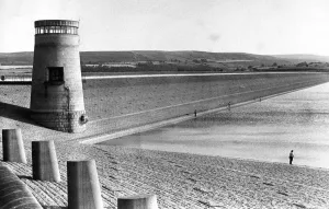 Loneliness Prints: No fighting over pitches at this stretch of water as anglers enjoy a spot of fishing