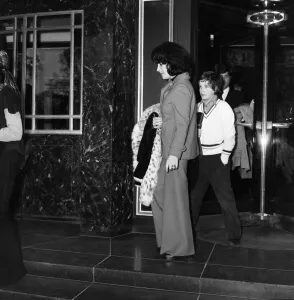 Film actress Elizabeth Taylor leaving her hotel in London as she prepares to fly to