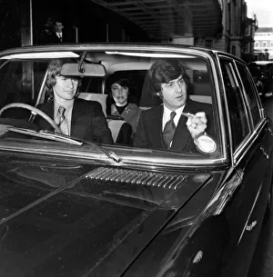 Film actress Elizabeth Taylor leaving her hotel in London as she prepares to fly to
