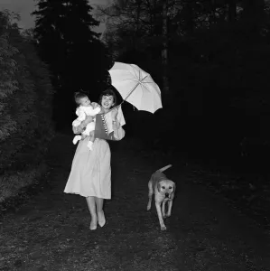 Basket Prints: Film actress Nanette Newman with her daughter Sarah and their dog Sam