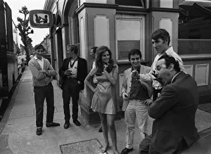 Talking Prints: Film Bedazzled 1967 Raquel Welch Dudley Moore and Peter Cook standing outside pub