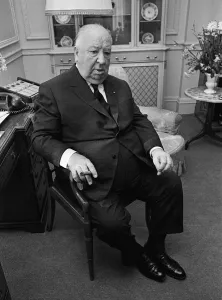 Film director Alfred Hitchcock smoking a cigar 1969gqmagazineusa gqmagazineusa