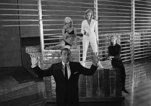 Film Goldfinger 1964 Sean Connery as James Bond 007 poses with Bond girls Honor Blackman