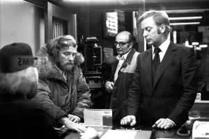 Film legend Michael Caine in Godrey Davies car hire office in Newcastle Central Station