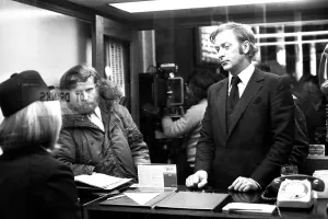 Film legend Michael Caine in Godrey Davies car hire office in Newcastle Central Station