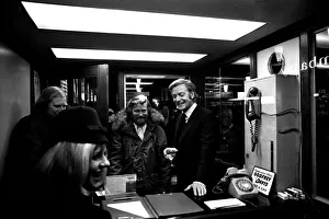 Film legend Michael Caine off-camera with a glass of wine in Godrey Davies car hire