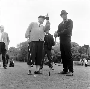 Filming the golf scene for Goldfinger'at Stoke Park golf course near Stoke