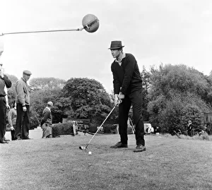 Filming the golf scene for Goldfinger'at Stoke Park golf course near Stoke
