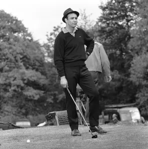 Filming the golf scene for Goldfinger'at Stoke Park golf course near Stoke