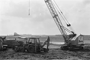 01137 Prints: On a fine August day in 1977, Concorde 101 touches down at her final home at Duxford