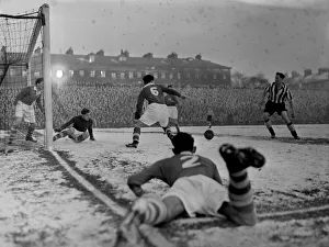 00226 Prints: Finnigan Staff Photographer Football Jan 26th 1952 Jackie