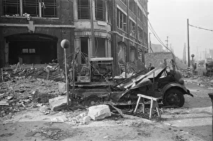 Fire appliances, hoses and ladders buried under debris at Carreras Tobacco Company
