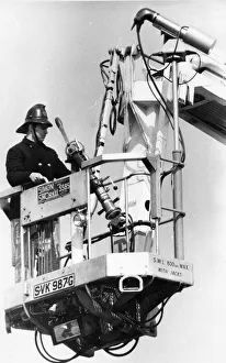 Firefighter Prints: Fire fighters demonstrate the latest in fire engine equipment - Simon Snorkel the cherry