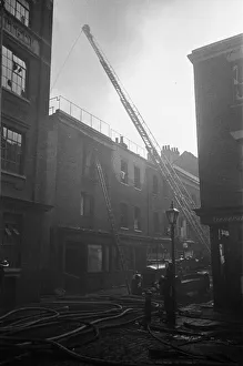 Fire fighters and emergency workers fight a fire at Brown Brothers, Great Eastern Street