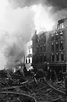 01487 Prints: Fire fighters and emergency workers fight a fire at Brown Brothers, Great Eastern Street