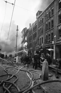01487 Prints: Fire fighters and emergency workers fight a fire at Brown Brothers, Great Eastern Street