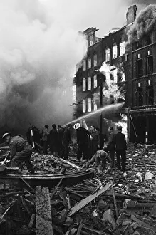 Fire fighters and emergency workers fight a fire at Brown Brothers, Great Eastern Street