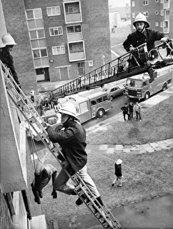 00072 Prints: Fire rescue demonstration at Walker - Firefighter Chris Foster (on turntable ladder
