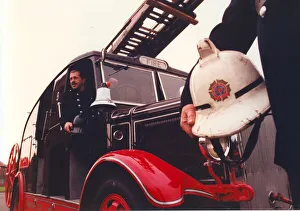00072 Prints: Firefighters Alistair Adam (moustache) and Paul Craggs have restored a 1937 Leyland fire
