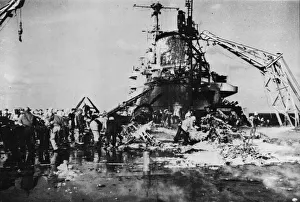 01445 Prints: Firefighters on board HMS Formidable inspect the wreckage