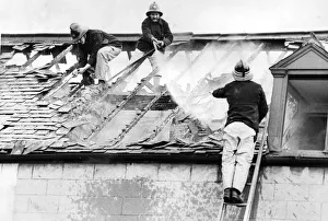 00074 Prints: Firefighters clambered over the roofs high above Stockton yesterday to tackle a blaze