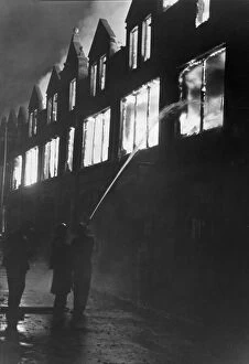 Firefighters Collection: Firefighters tend to a blazing buildings in Cardiff city centre