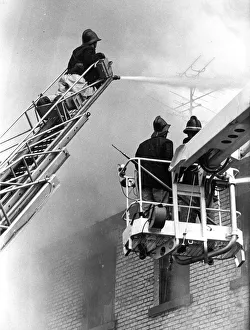 Hosepipe Prints: Firefighters try to control the warehouse blaze at High Street East in Sunderland
