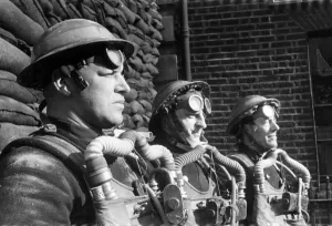 Firefighter Prints: Firefighters wearing breathing apparatus during a training exercise. Circa 1940