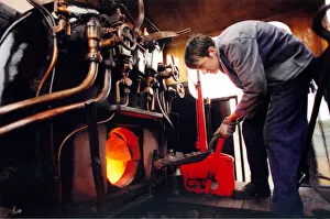 Shovel Prints: Fireman Andrew Arnold, stokes up the Tanfield Rambler on 28th August 1997