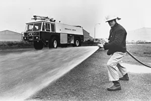 Firefighter Prints: Fireman Bob Ford with the new fire engine at Newcastle Airport