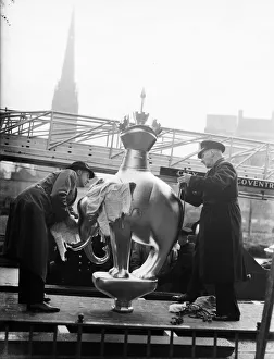 Firefighter Prints: Fireman helps place the Elephant and Castle statue on top of the standard in Broadgate