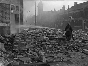 01466 Prints: Firemen dampening down the burnt out shell of the Dobson & Crowther factory, Aston Road