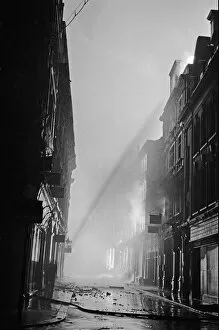 Firefighters Collection: Firemen tackling fires in Ave Maria Lane, London, started by high explosive