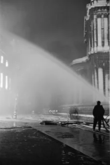 Smoke Prints: Firemen tackling fires in St Pauls Churchyard to stop the blaze reaching