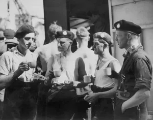 00075 Prints: Firemen wearing their Second Front'berets assisting their colleagues in
