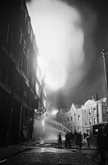 Firemen at work at Liptons Storehouse on Tabernacle St, Shoreditch