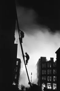 Firemen at work in Shoreditch. 11th January 1941