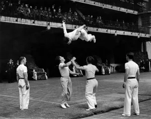 Acrobats Prints: Firemens Agility display team giving demonstration. June 1942 P009980