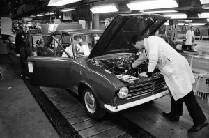 Motors Prints: The first car on the production line at Ford motor plant in Dagenham following the strike