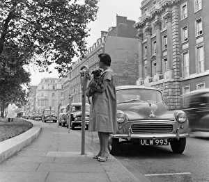 Motoring Prints: The first parking meter in England. The first parking meters are introduced in