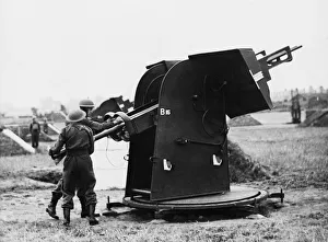 01432 Prints: First pictures of the Home Guard A. A in action loading a projector. 8th July 1942
