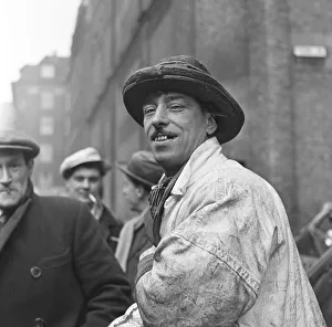 Fishmonger Prints: Fish porter wearing his distintive hat at Billingsgate Fish Market in the East End of