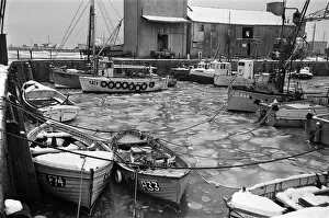 Images Dated 27th October 2016: Fishing boats frozen in Whitstable Harbour, Kent. 20th January 1966