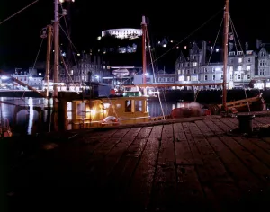 Illuminations Prints: Fishing boats in harbour February 1979 at night in Oban scotland