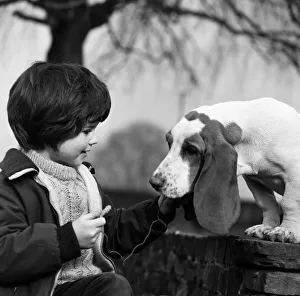 Puppy Prints: Five-year-old Caroline Williams of Northwood Hills with five-month-old Basset Hound puppy