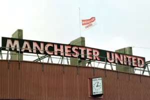 Tragedy Prints: Flag at half mast at Old Trafford February 1998 as a tribute to the 40th