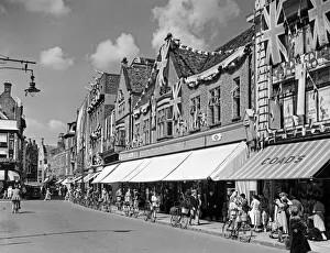 Bunting Prints: Flags fluttering in the breeze, decorations in traditional colours lining the streets