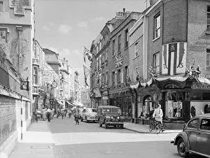 Bunting Prints: Flags fluttering in the breeze, decorations in traditional colours lining the streets