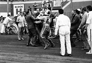 Speedway Prints: Flare up at Belle Vue. Officials rush in to separate Belle Vue rider Alan Wilkinson
